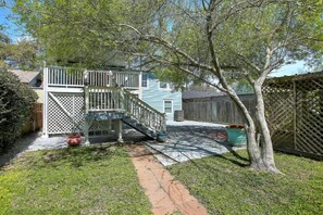 Beautiful backyard, fully fenced with a shade tree