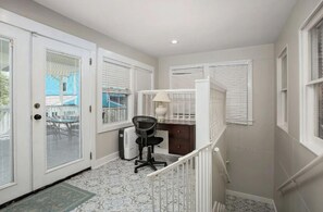 Great desk nook for remote work, or play, just up the stairs.