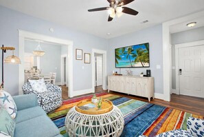 Relax and unwind in your spacious livingroom after a fun day at the beach, (just across the street), at the lovely Sunrise Serenade!