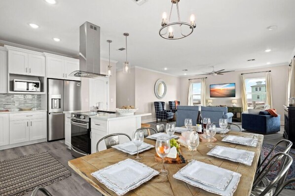 Beautiful open concept, with a high end kitchen, and room to gather with family and friends.
