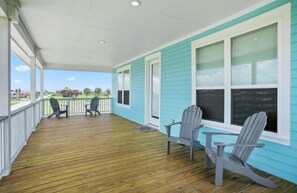 Nice large porch to lounge and enjoy the ocean breeze.  Great spot for morning coffee!