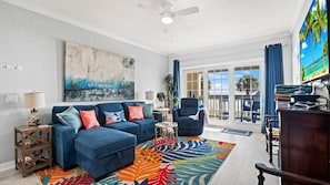 Cozy seating and balcony access from the living room