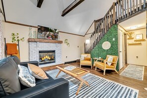 Living room with TV and seating
