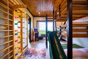 The kids will LOVE the bunk area with indoor slide, climbing play wall, multiple arcades, and all sorts of fun games.
