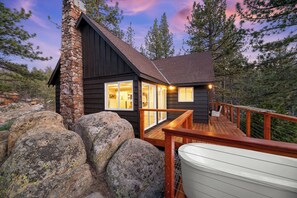 Outdoor soaking tub on deck.