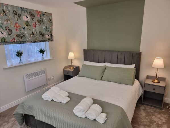 Master Bedroom with a king size bed