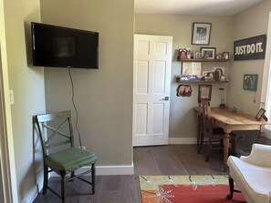 tv room and workspace