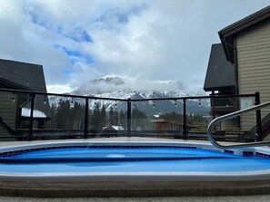 Rooftop hot tub with mountain views