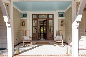 View of the home with the front door ajar