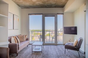 Comfortable living room with private balcony