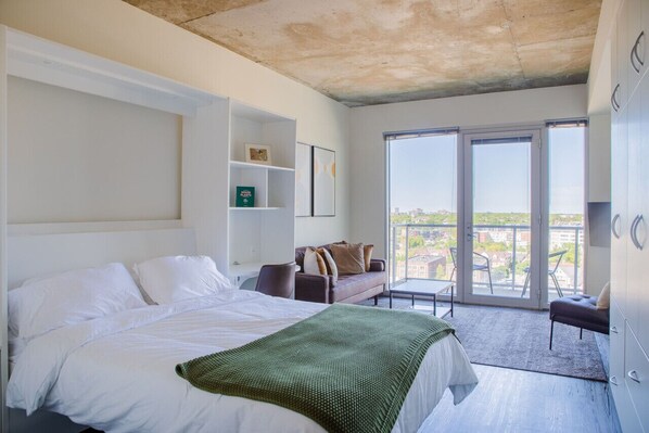 Murphy bed that folds up into a dining table/workspace