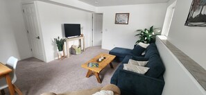 Living room facing bedroom door
