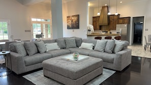 Amazingly comfy sofa with massive ottoman that turns into queen bed!