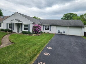 Front of house with 2 car garage and driveway
