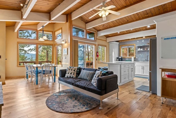 Upstairs living room with open access to the kitchen and dining areas