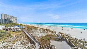 View of the beach and water from the balcony.