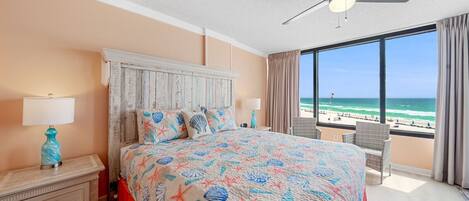 Wake up to stunning Gulf views in this beachfront bedroom featuring coastal décor and a king-size bed. Floor-to-ceiling windows bring the beauty of the beach right into your room.