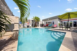 Experience tranquility in refreshing private pool of the home in Aruba - Great for families with kids, a serene oasis for relaxation and rejuvenation - Experience alchemy of comfort and nature in outdoor lounge retreat featuring plenty of seating