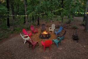 Create unforgettable memories under the stars at our firepit, with twinkling lights above to enhance the ambiance. Indulge in s'mores and cherish the moment with our Host-provided S'mores Welcome Gift.
