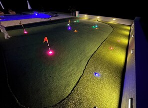LED golf balls and cup lights for night fun