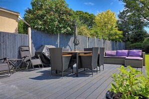 The glorious backyard is perfect for relaxing under the stars or enjoying a BBQ