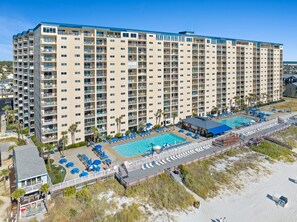 Dive into luxury with not just one, but two large pools to choose from, including one heated year-round for your comfort! 🌴 Enjoy endless relaxation under the sun while indulging in refreshing cocktails and savory bites without ever having to leave.