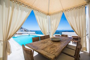 Magnificent Santorini Villa | 3 Bedrooms | Villa Bacchus | Private heated pool & Alfresco Pergola Dining Area| Firostefani