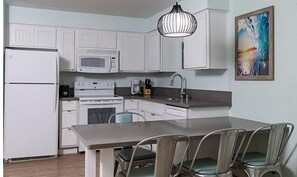 mission-valley-1br-kitchen-1-664x386_enhanced