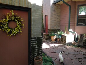 Door to carriage house off patio