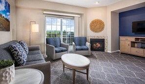 two-bedroom-living-room-664x386_enhanced