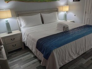 Amazing master bedroom with door to balcony.