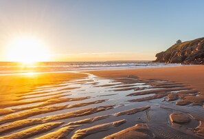 Enjoy a sunset stroll at Rinsey Cove