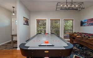 Indoor Game Room with Air Hockey and Foosball Table