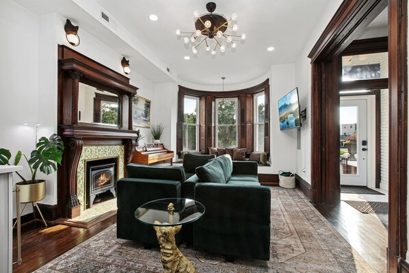 Play some music on the piano, cozy up by the fireplace and relax after a day exploring DC!