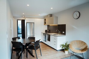 Fisher & Paykel fridge, freezer, oven, induction stove, extraction, dishwasher.