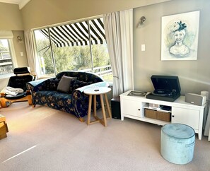Turntable with vinyl collection. 