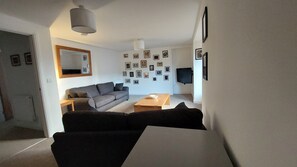 Sitting Room with 4seater sofa & 2seater sofabed, desk, TV with firestick, wifi.