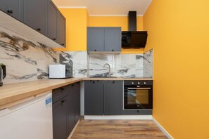 Modern, fully equipped kitchenette. 