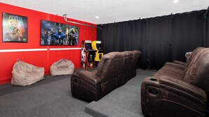Immerse yourself in a cinematic experience in the movie/game room