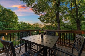 Relax on our private balcony with serene sunset views, perfect for a getaway.