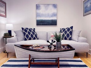 Living room with boat coffee table.  