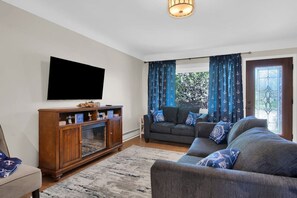 Relax and reconnect with friends and family in this cozy living room