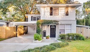 Jasmine draped front entry.