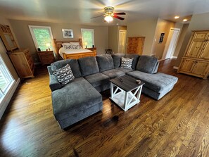 Family room with sectional and TV.