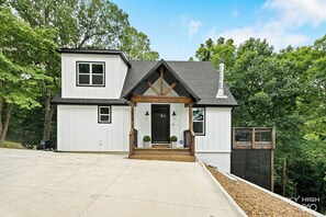 front of the house with parking for 5 cars