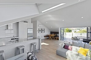 Stainless kitchen for the extra clean look with bar seating