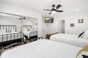Bedroom 2 with 2 queen beds with bathroom and large shower.