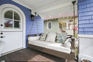 Imagine morning coffee with a good book on this big comfy swing...