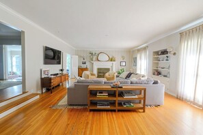 family room filled with art, light, and the heart of the home