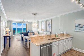 The fully equipped kitchen features granite countertops and stainless-steel appliances and has everything you need to prepare meals for family & friends.